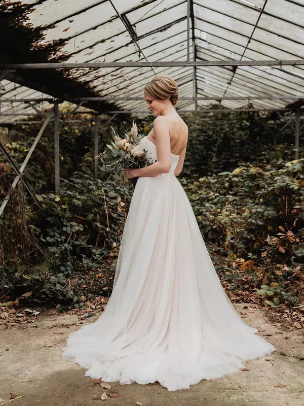Luolandi Delicate Tulle Off-The-Shoulder Strapless Neckline Beaded A-line Wedding Dresses Charming
